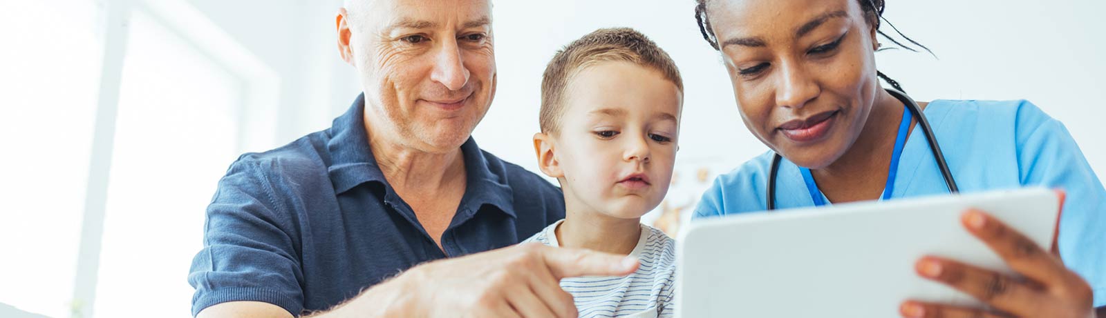 Father and son at a doctor's appointment