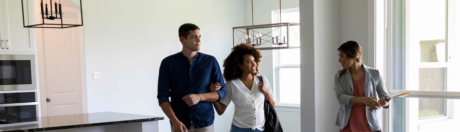 Couple touring a house that is for sale